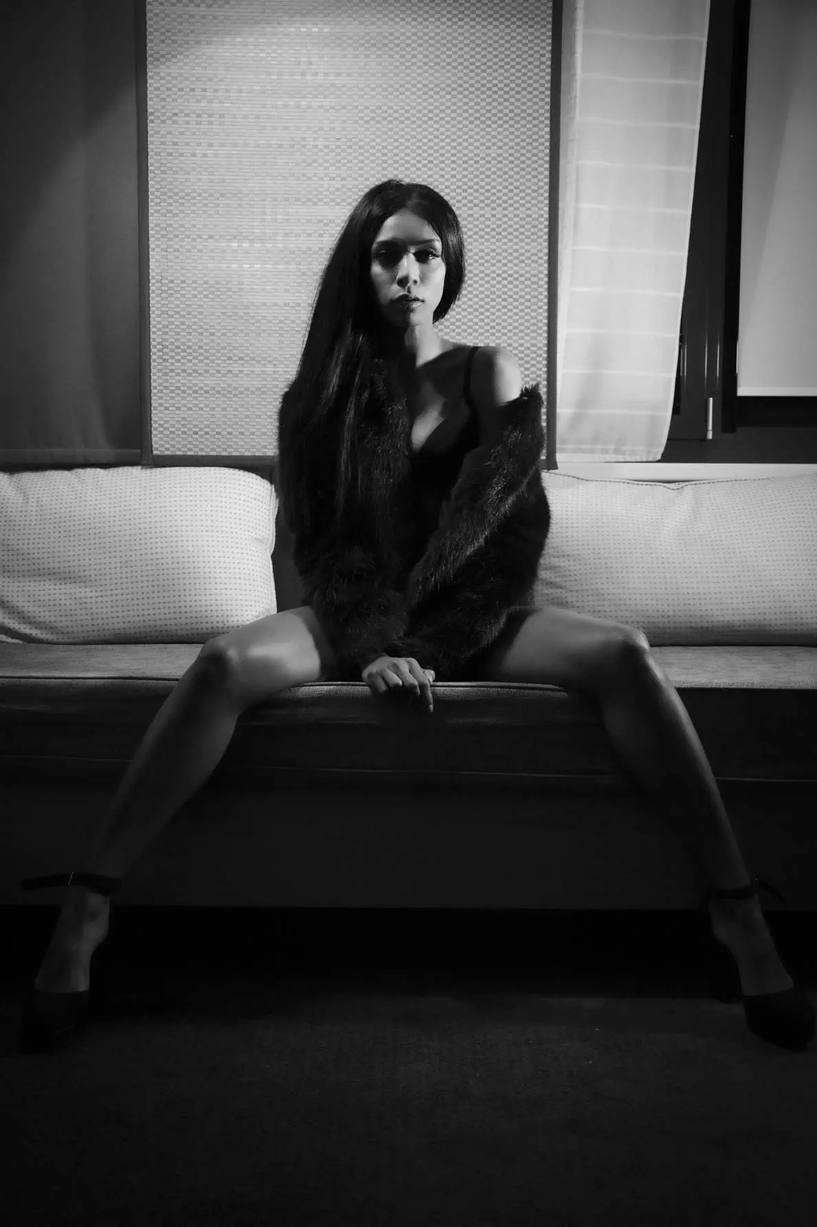 Nude Art Photography Vienna — black-and-white nude portrait with dramatic light